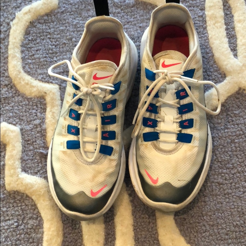 White, pink, and blue sneakers from Nike.Size- 3.5